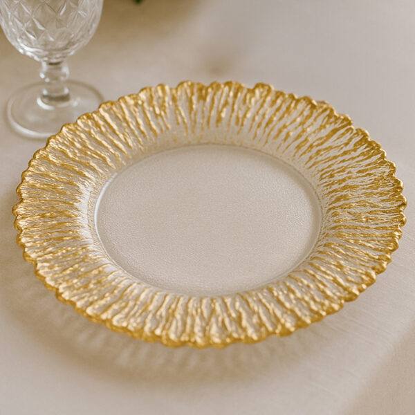 assiette soleil en verre sur table